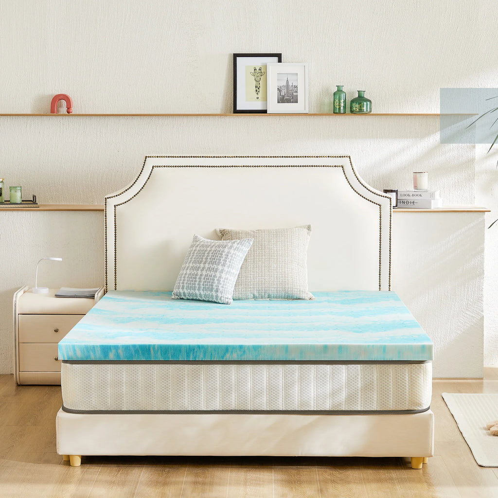 JHK memory foam mattress topper laid out on a bed showing its thickness and soft texture