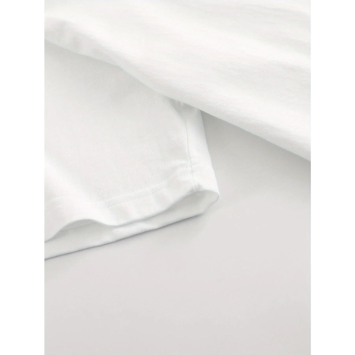 Close-up of a white t-shirt sleeve hem