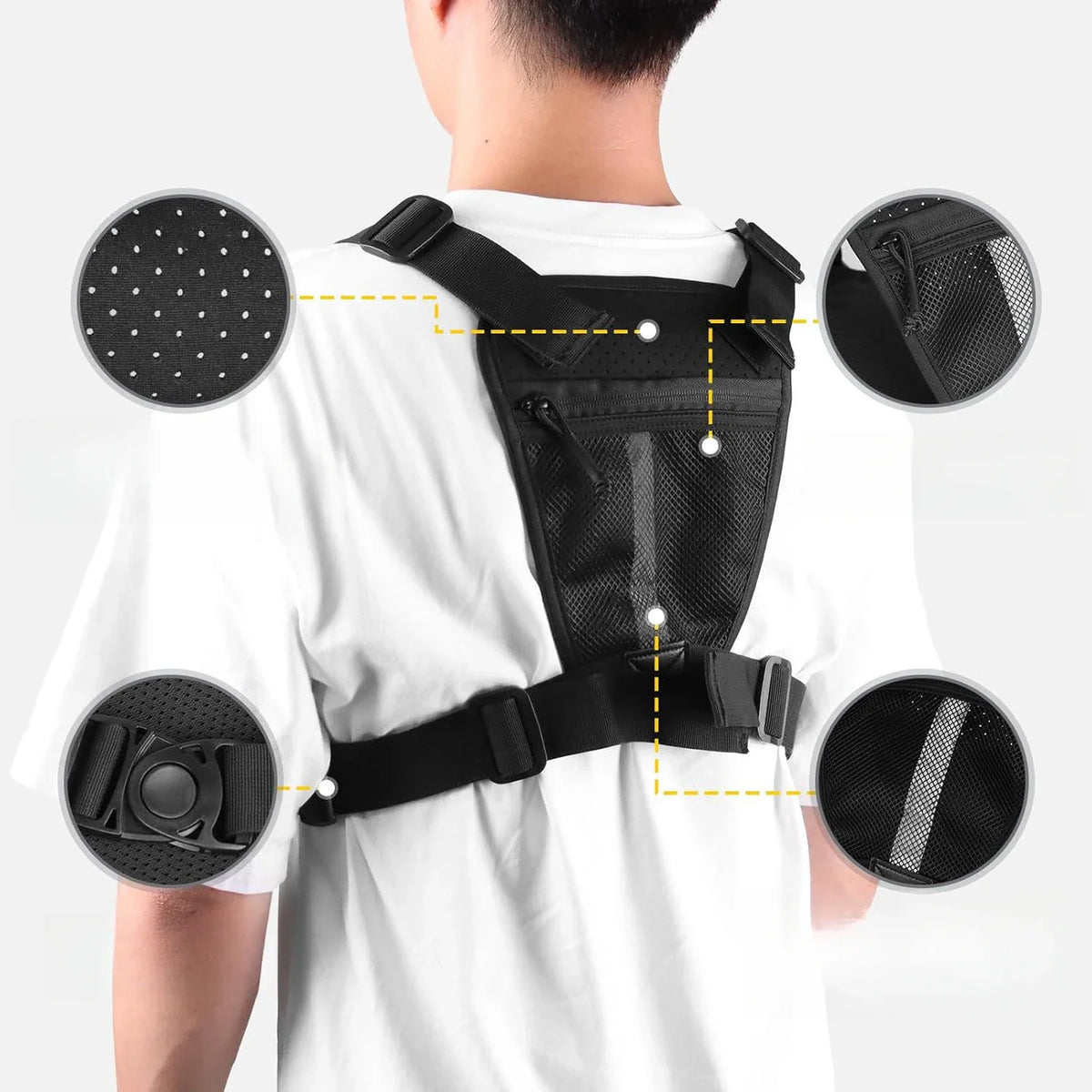 Close-up of the back mesh panel and adjustable buckles of a black tactical chest bag worn by a person.