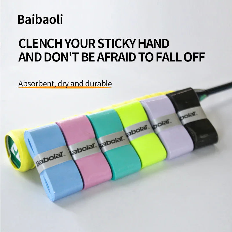 A collection of colorful tennis racket overgrips applied to a racket handle.