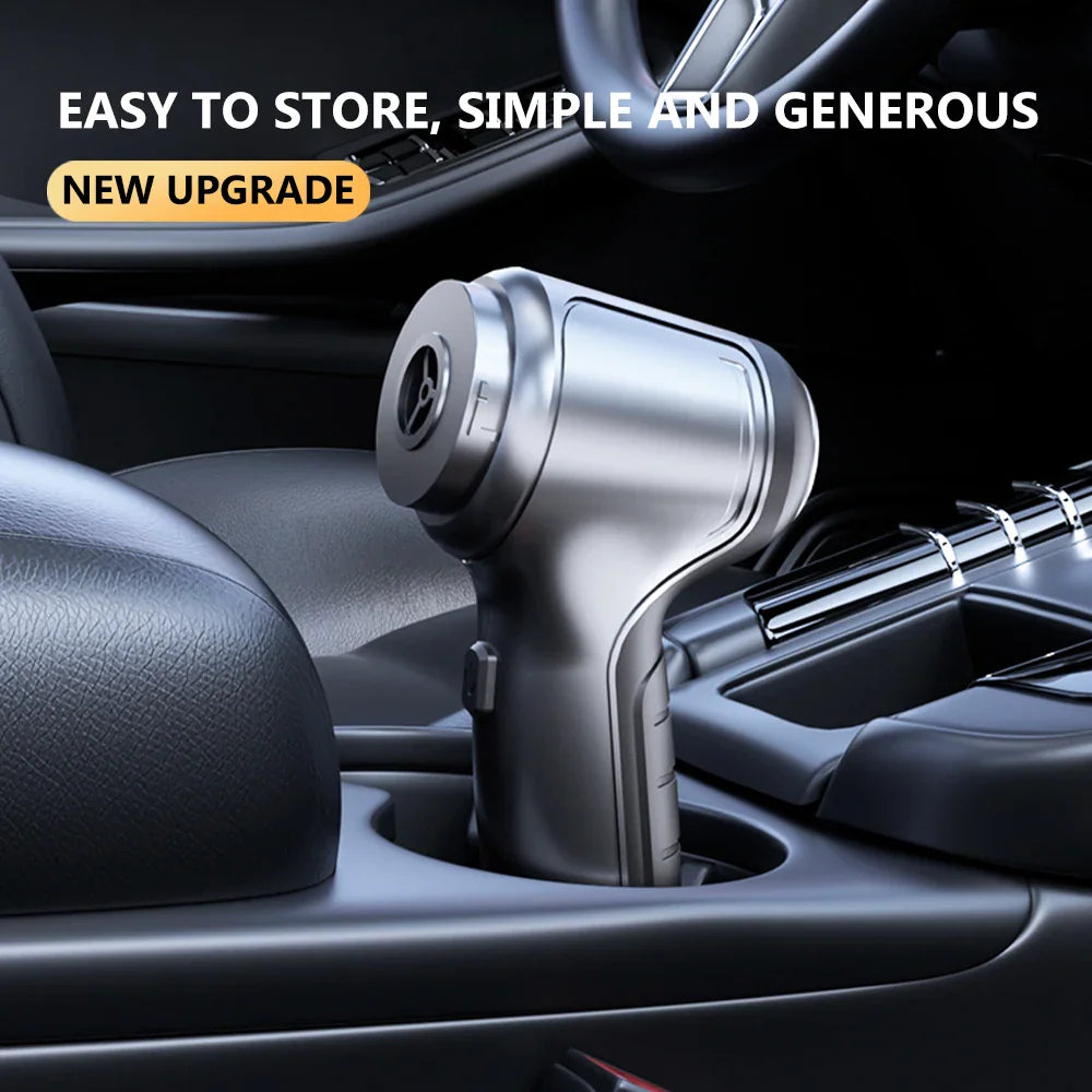 Handheld vacuum cleaner placed in a car cup holder.
