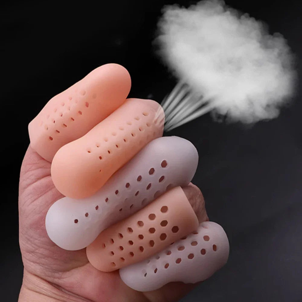 Hand wearing breathable silicone finger caps for toe and finger care