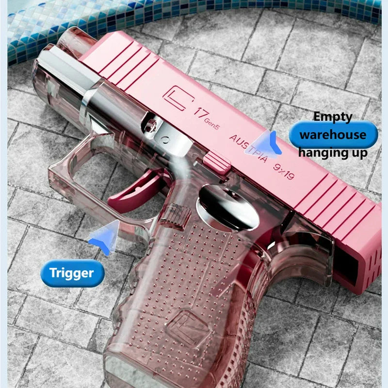 Pink transparent water pistol toy with feature callouts