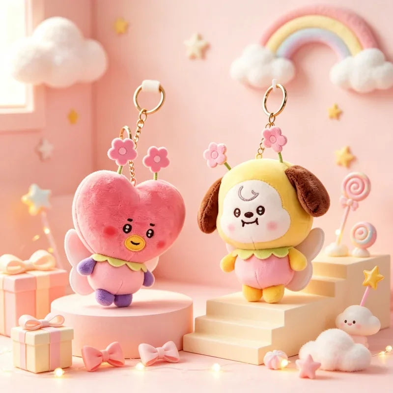 Two plush heart and puppy keychains with floral details on a pink background
