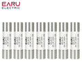 A collection of cylindrical solar PV fuses with different amperage ratings ranging from 6A to 32A.