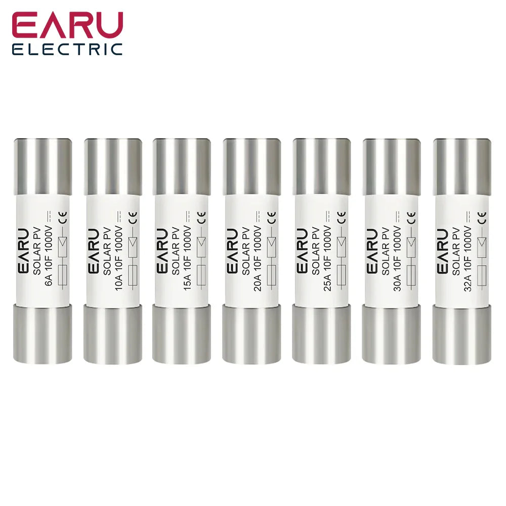 A collection of cylindrical solar PV fuses with different amperage ratings ranging from 6A to 32A.