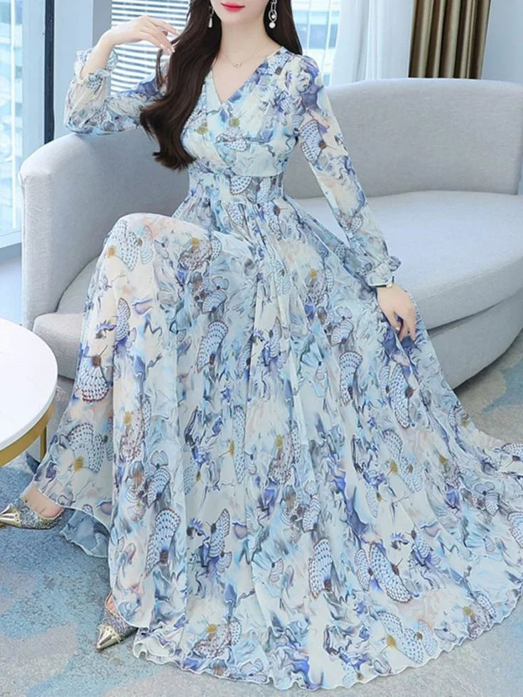 Long sleeve maxi dress with blue butterfly print and v-neck