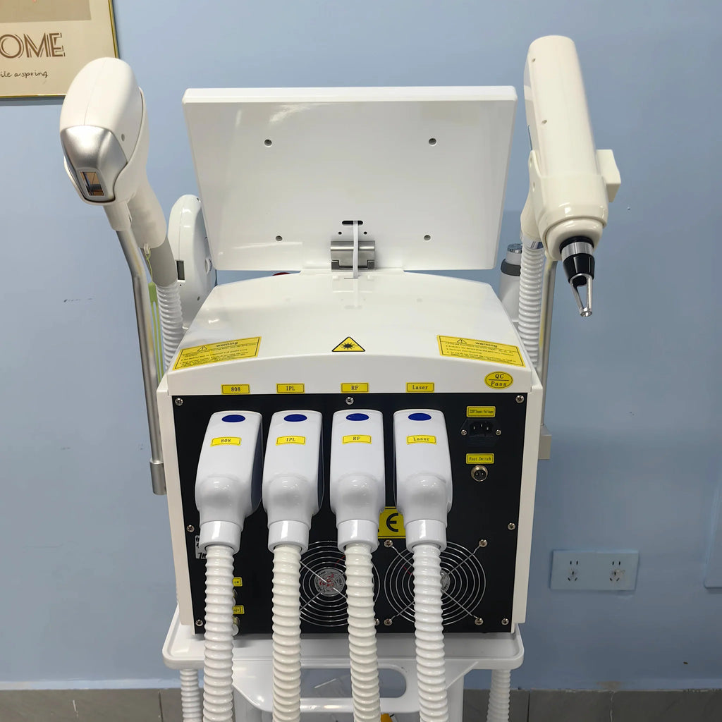 Back view of a white professional beauty laser machine with multiple cable connections