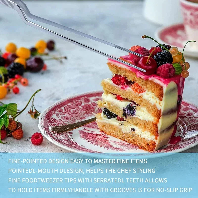 Stainless steel cooking tweezers plating a gourmet dessert with berries