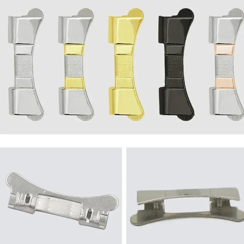 Assorted metal watch band end connectors in gold, silver, black, and two-tone finishes