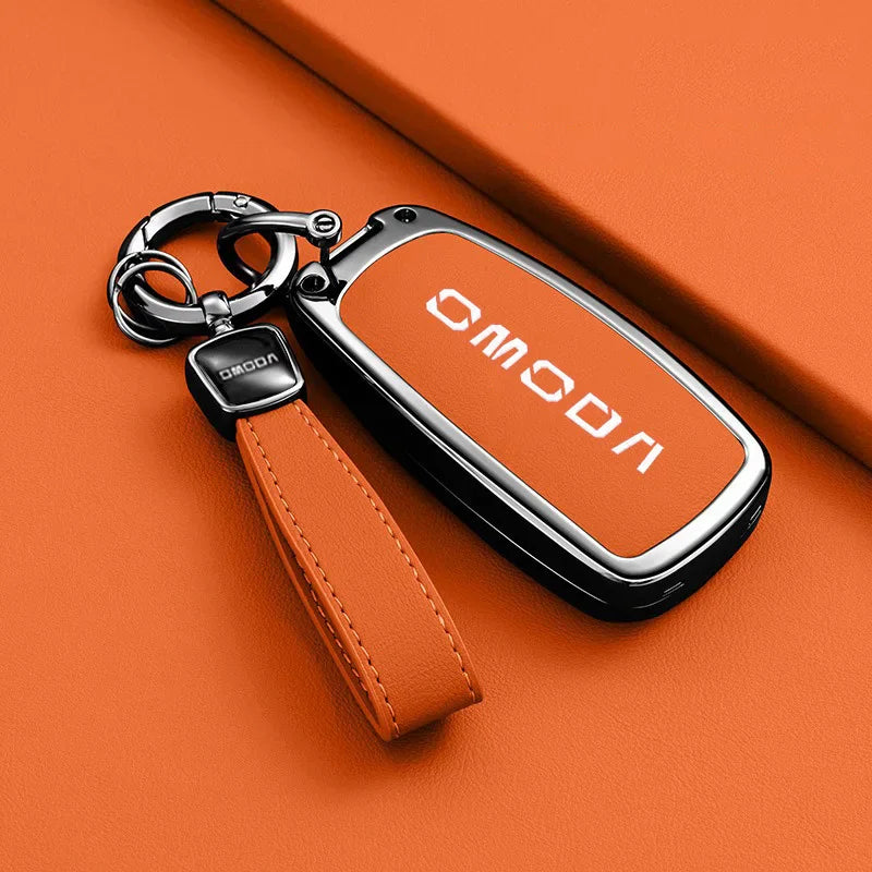 Orange car key fob cover with matching strap and keychain