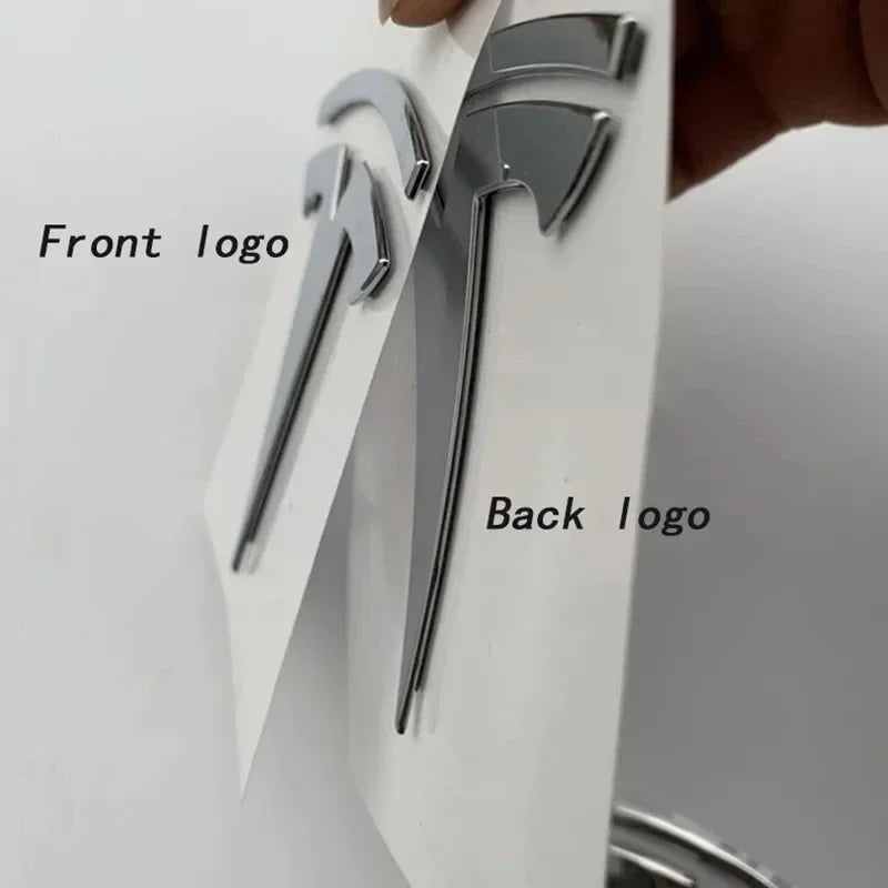 Side profile view of front hood and rear trunk adhesive emblems