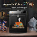 3D printer printing a colorful model house on its print bed.