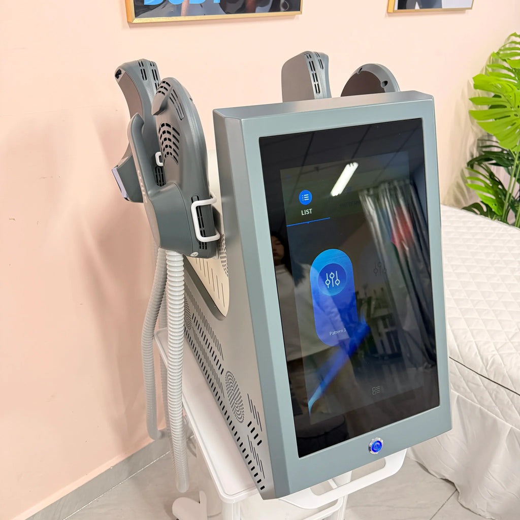 Side view of a professional EMS body sculpting machine with applicators on a stand