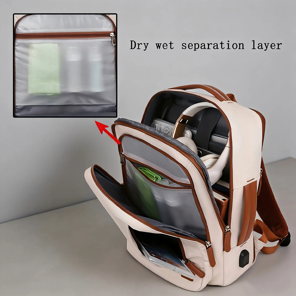 Open laptop backpack showing interior compartments including a wet-dry separation pocket.