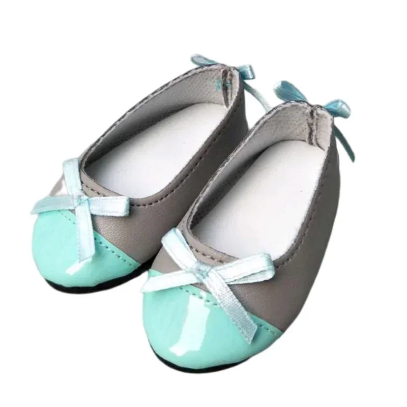 Pair of grey and mint green two-tone doll ballet flats with bows