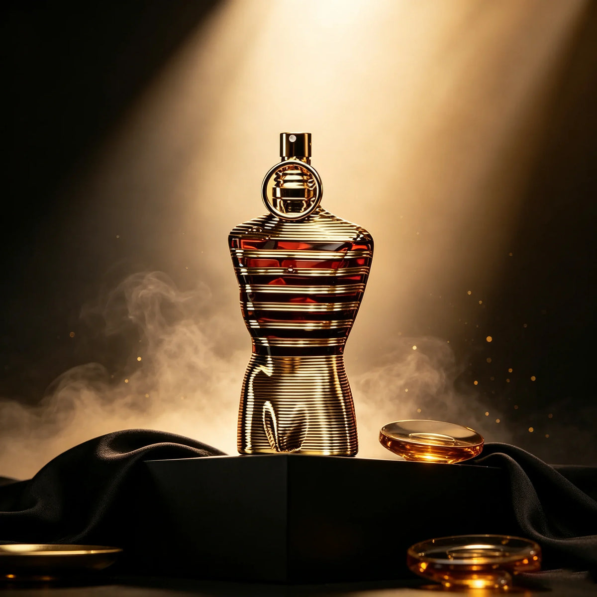 Gold striped male torso shaped perfume bottle on a black stage with smoke effect