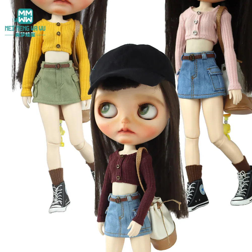 Dolls wearing varied coloured cropped knit tops and miniskirts with caps and bags