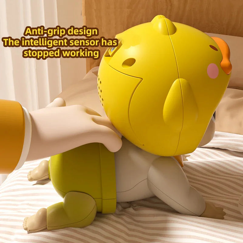 A hand touching the back of a yellow crawling doll toy, highlighting its anti-grip and sensor design.