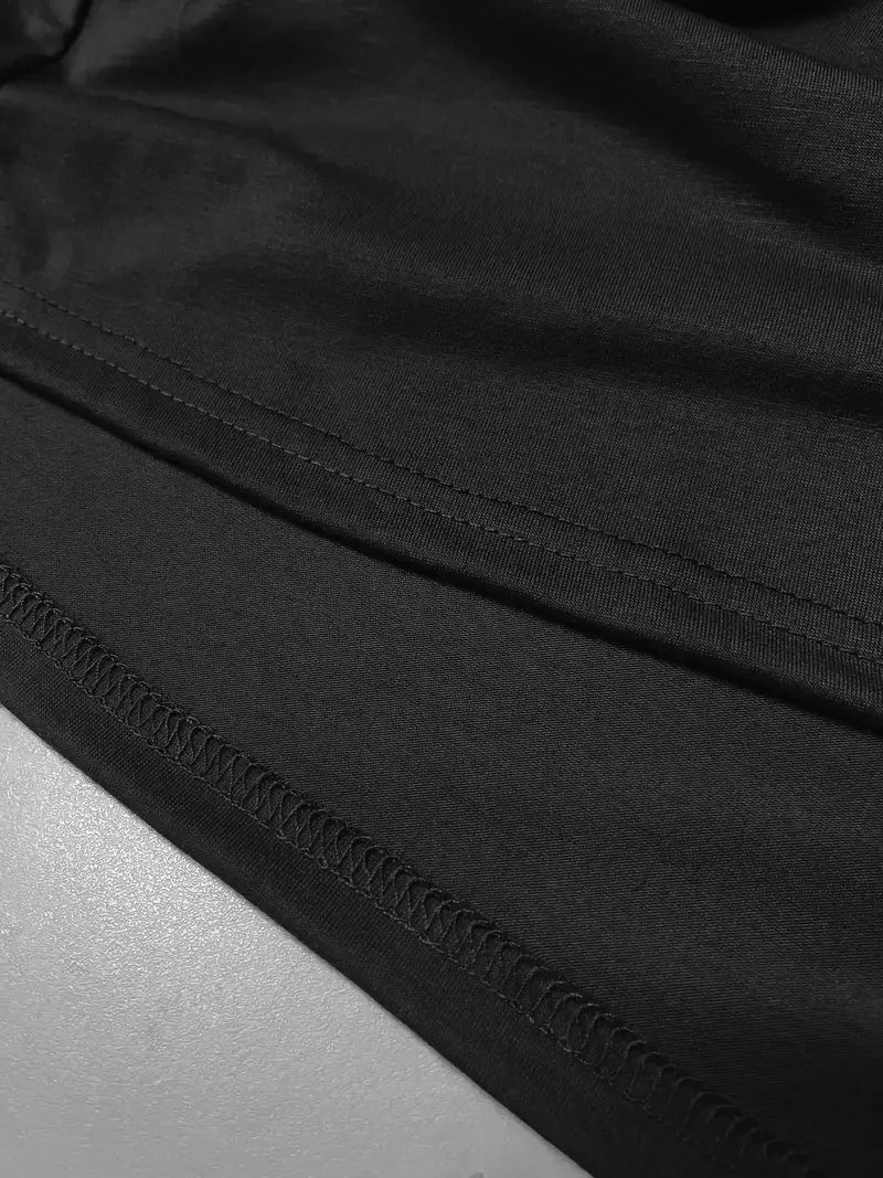 Close-up of the hem stitching on a black fabric