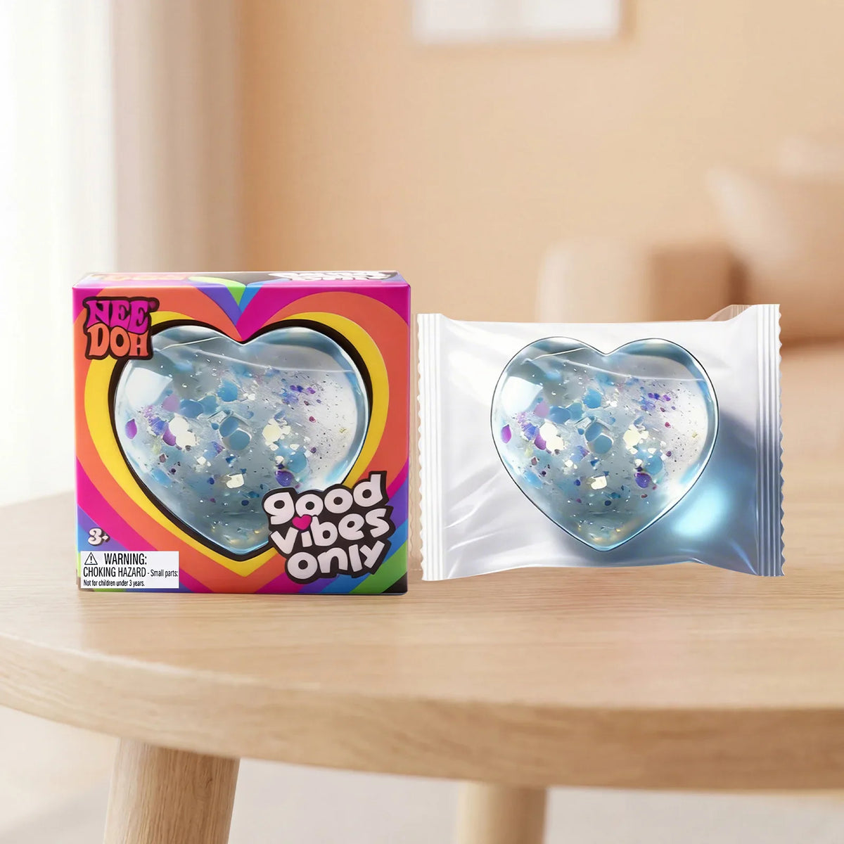 Heart shaped squishy toy in packaging and box