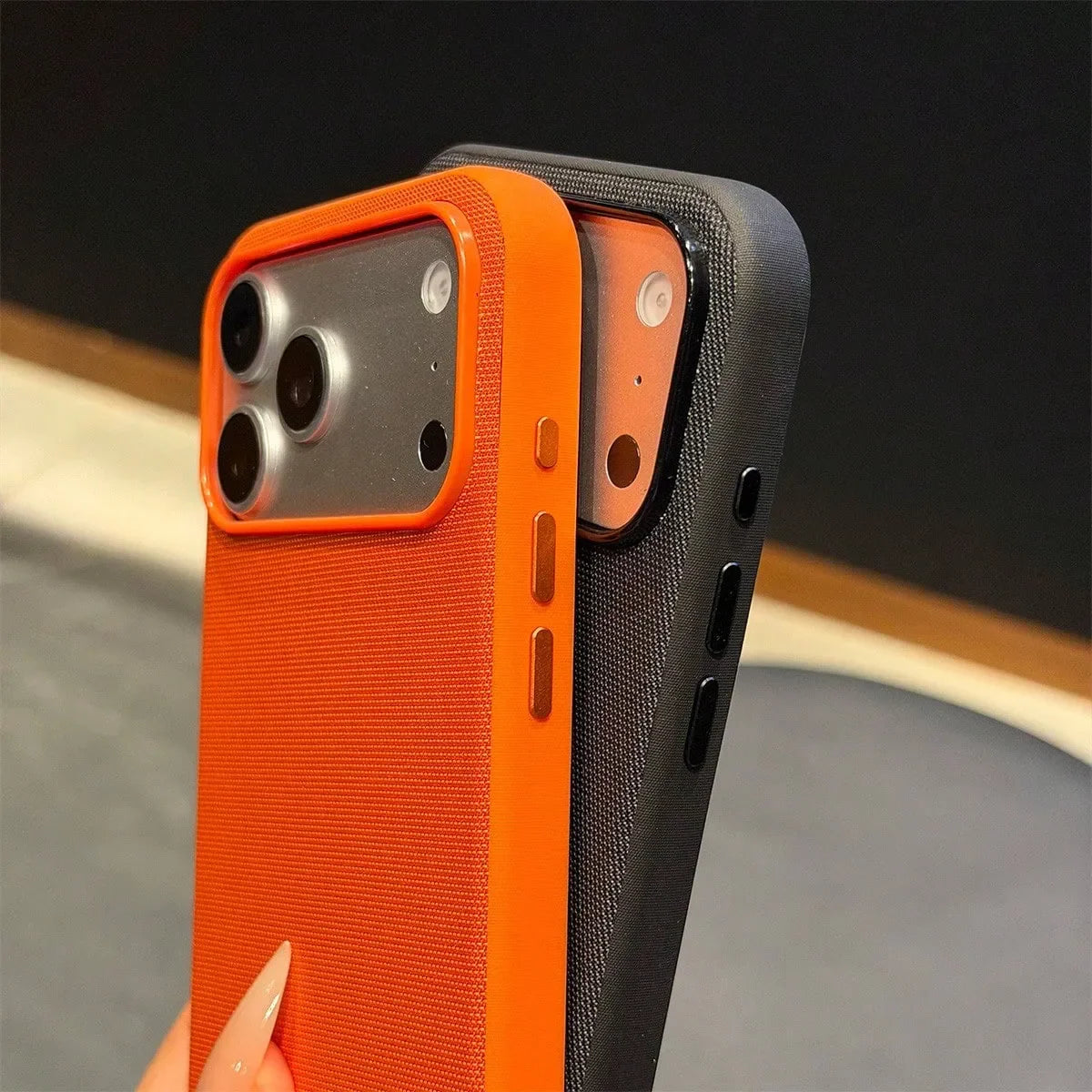 Orange and black woven fabric protective phone cases side view