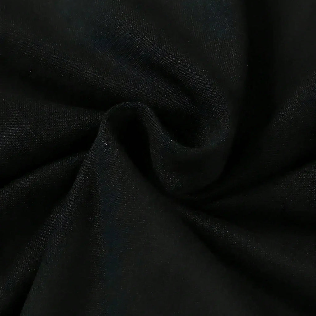 Close up of smooth black fabric of a t-shirt