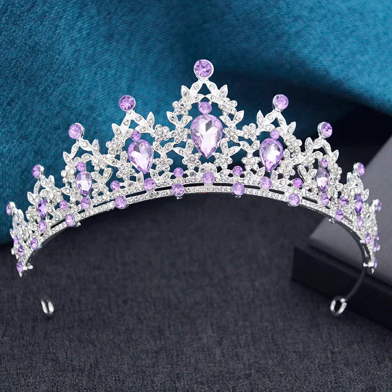 Silver tiara with purple teardrop and round rhinestones