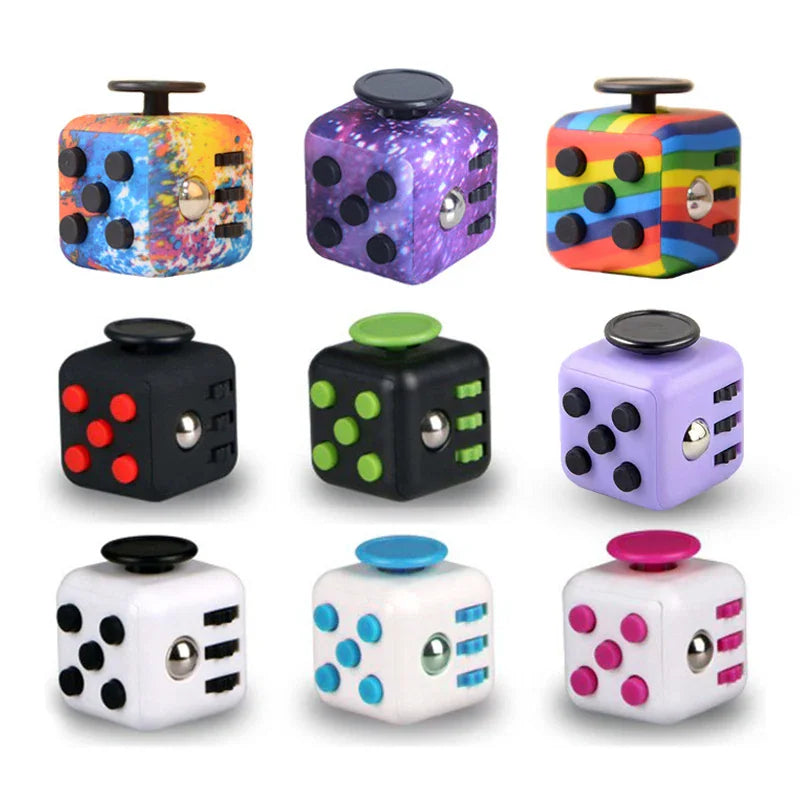 A collection of various colourful fidget cubes with different designs.