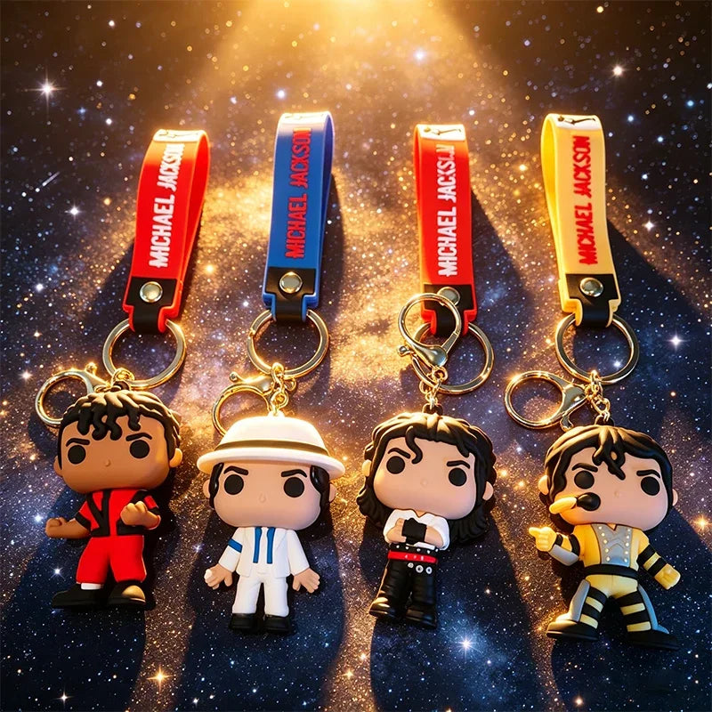 Four Michael Jackson themed vinyl-style doll keychains with different outfits.