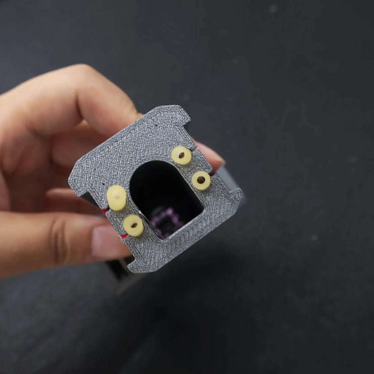 Bottom view of a slingshot magazine loading port