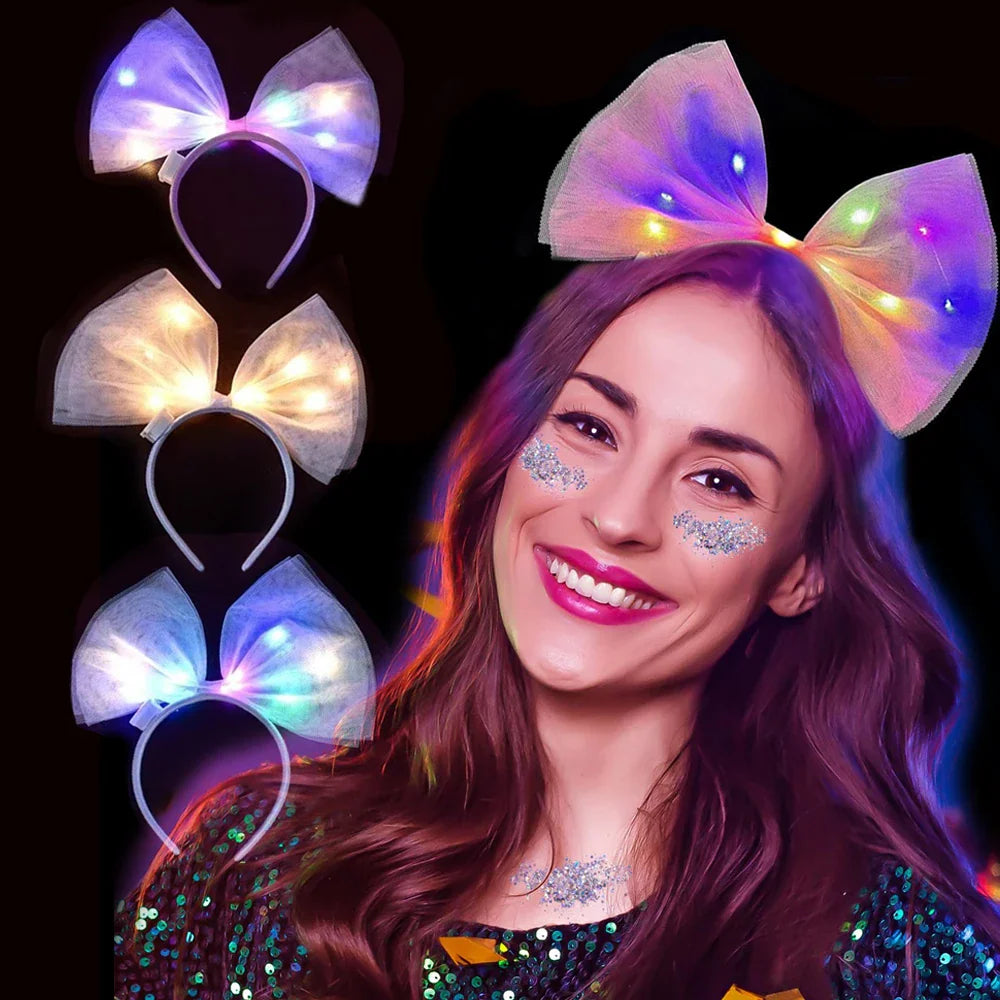 A woman wearing a glowing LED tulle bow headband with three floating bow headbands beside her