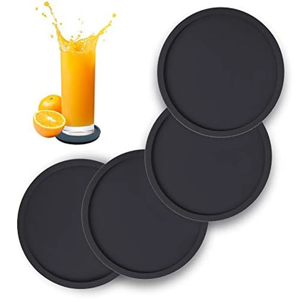 Set of round black silicone drink coasters