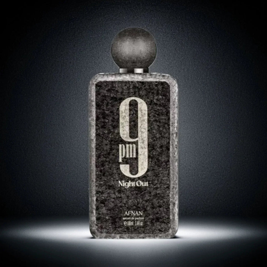 A black textured men's perfume bottle with a round cap against a dark background.