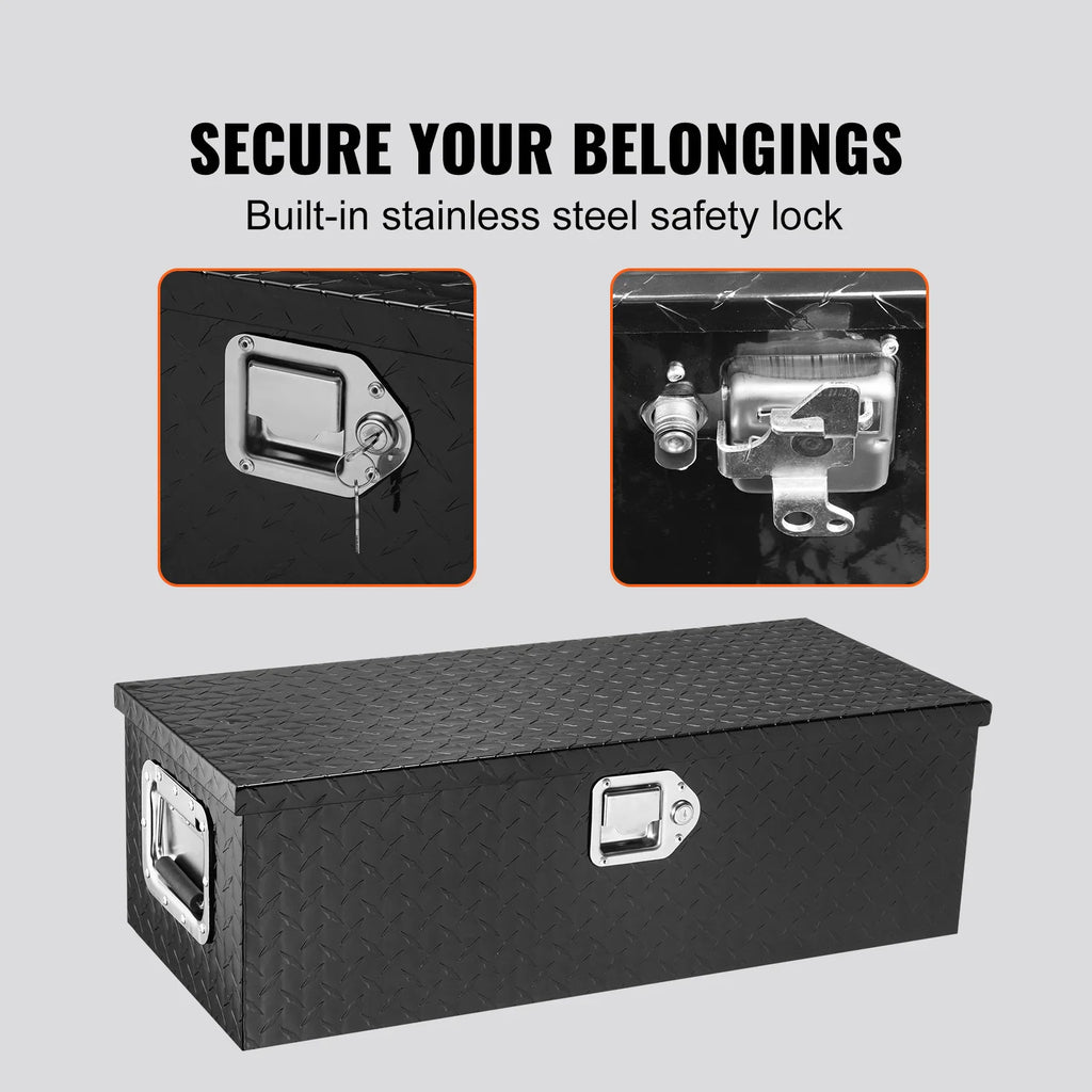 Black aluminum tool box showing close up detail of the stainless steel locking mechanism