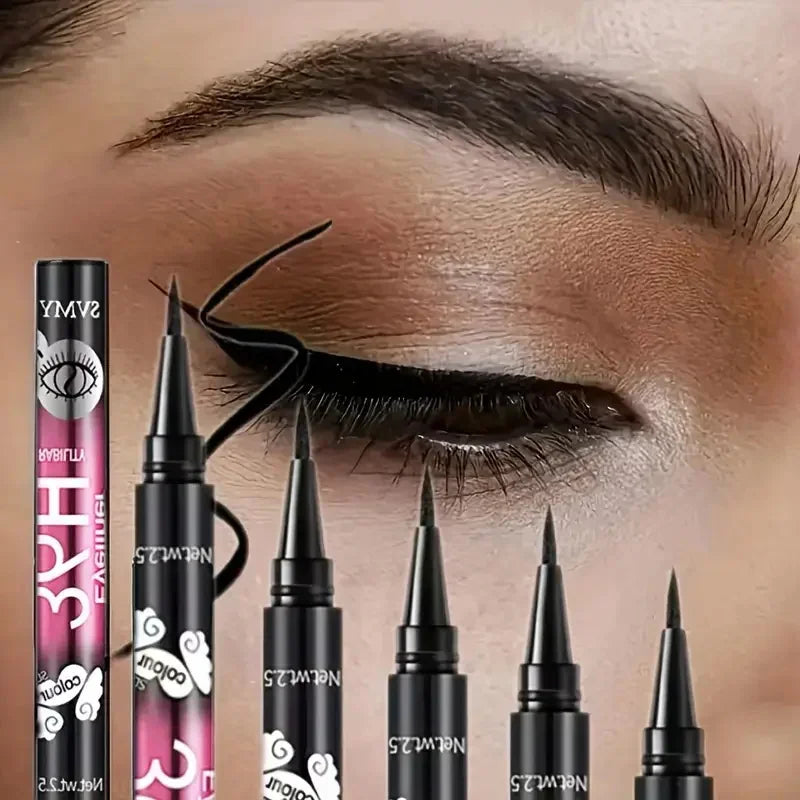 Several black liquid eyeliner pens placed against a background showing a close-up of eye makeup