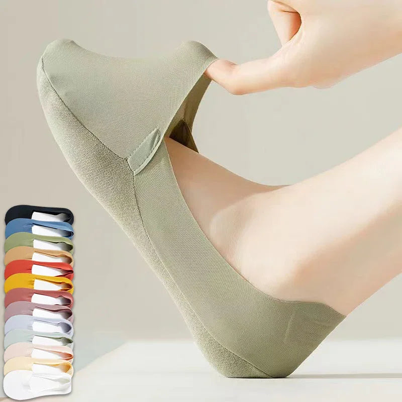 Olive green invisible low-cut liner sock worn on a foot with a stacked color palette icon