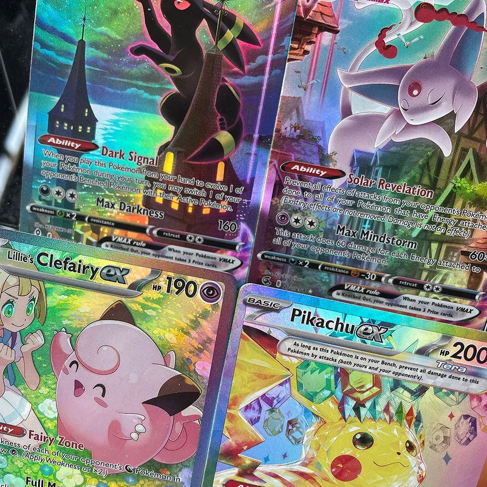 Close up shots of four different holographic trading cards