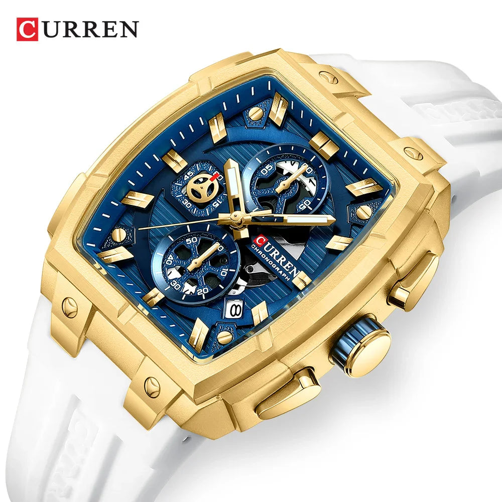 Men's square chronograph watch with gold case, blue dial, and white silicone strap