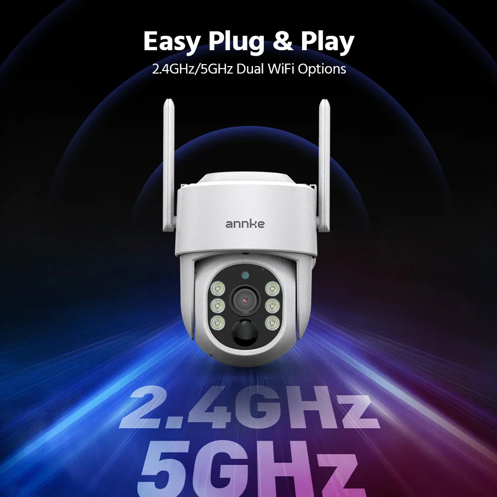 A white smart security camera with antennas isolated against a blue background
