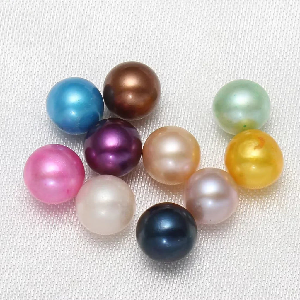 A collection of colorful round freshwater pearls in various shades