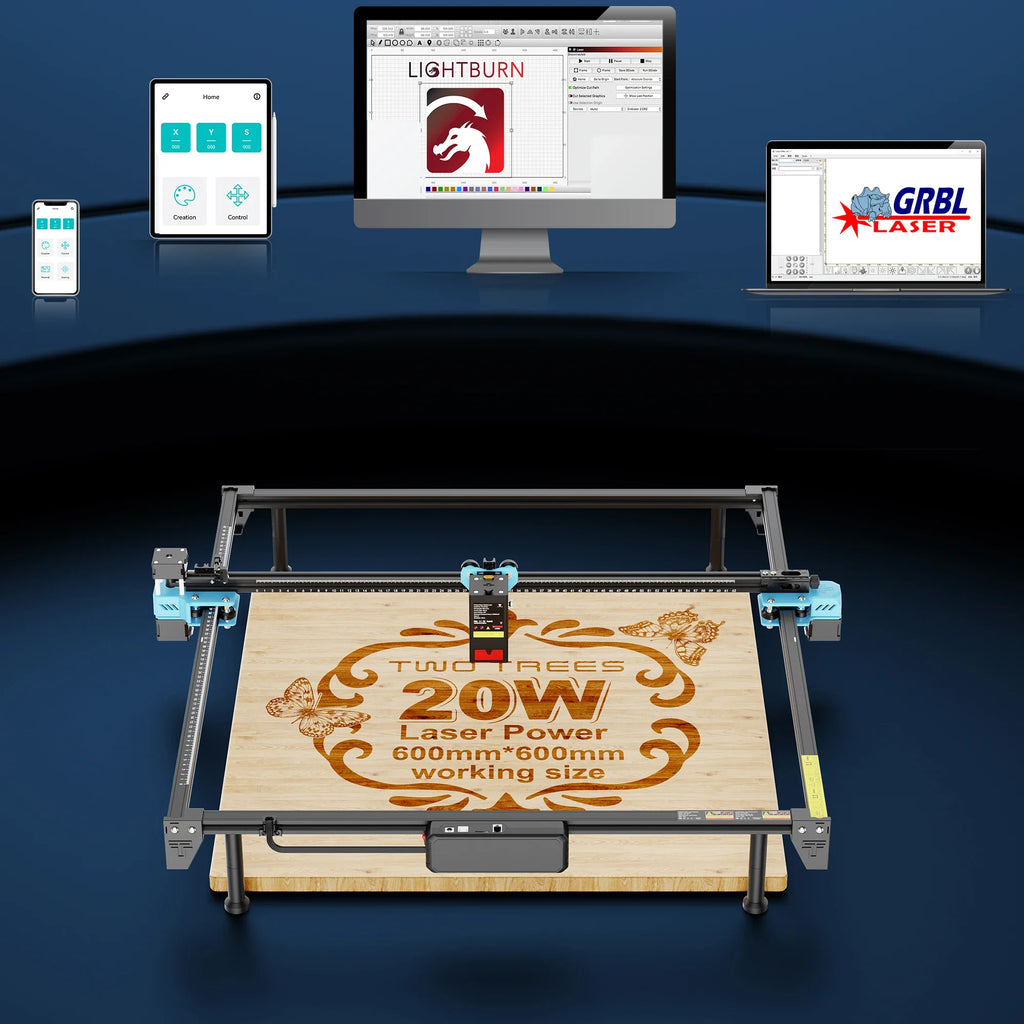 Laser engraver setup with computer software interface displayed on monitors