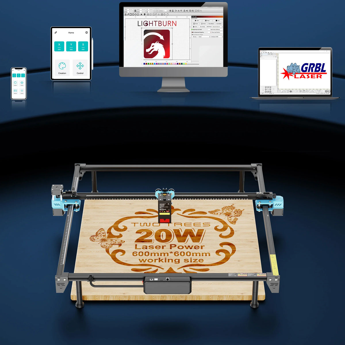 Laser engraver setup with computer software interface displayed on monitors