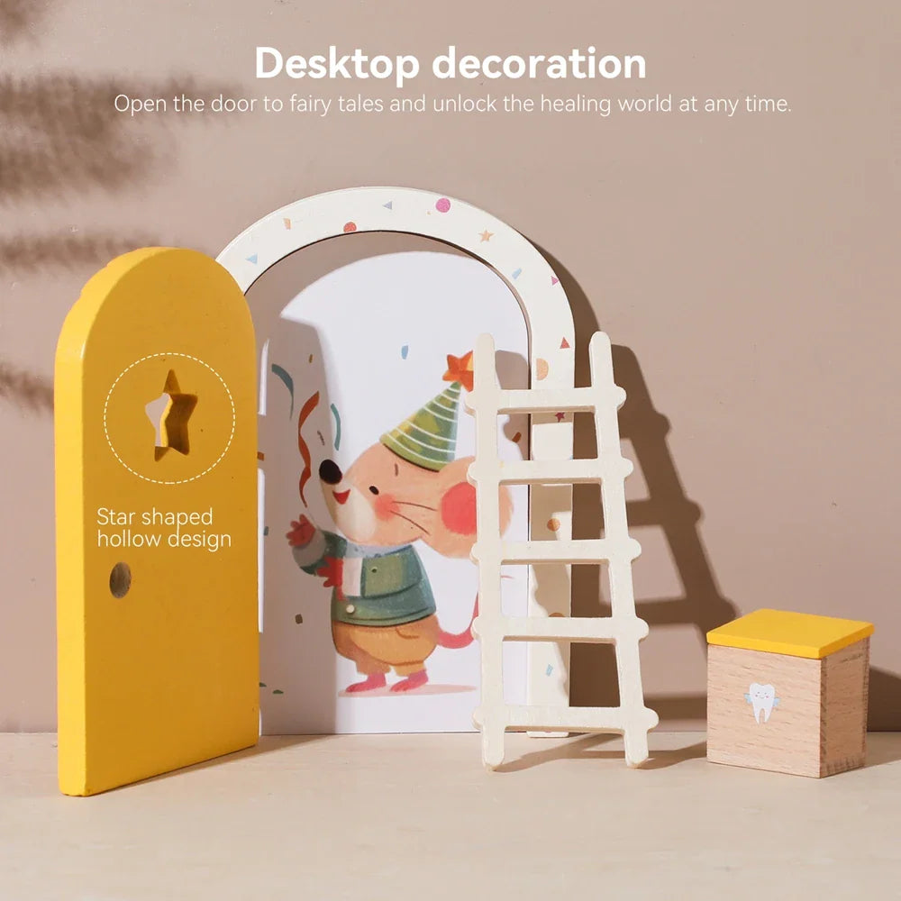Miniature wooden fairy door set with a ladder and a small tooth storage box
