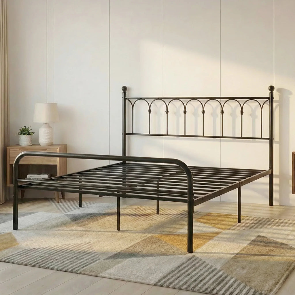 Black metal platform bed frame in a furnished bedroom