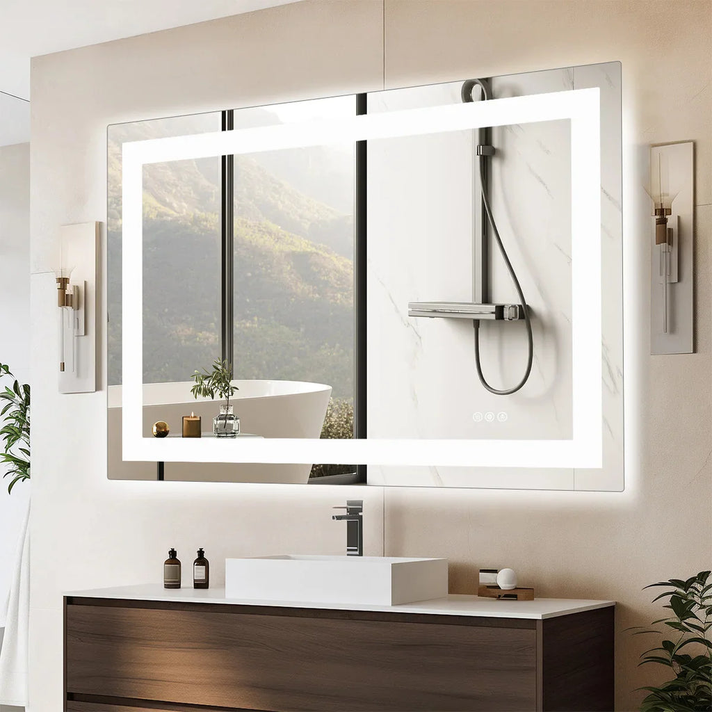 Large rectangular LED bathroom vanity mirror with front light above a modern dark wood vanity