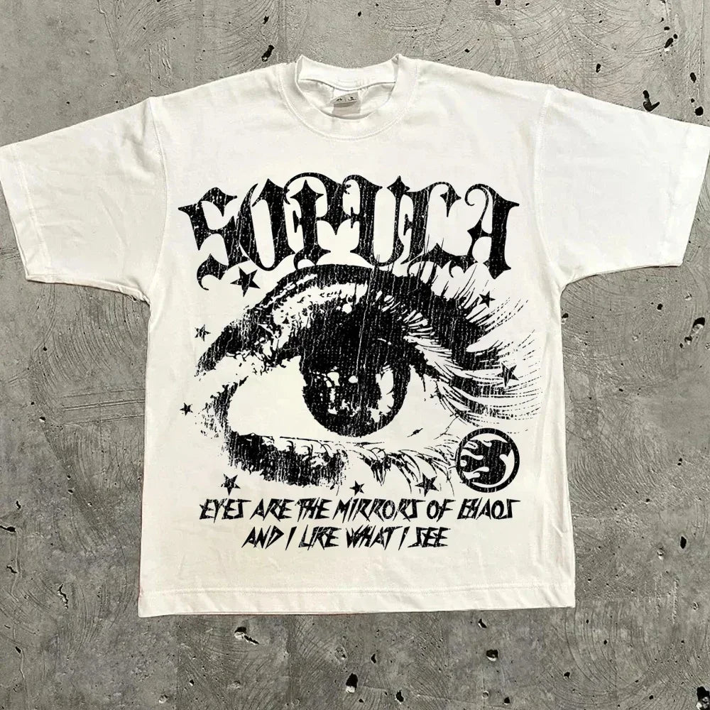 White oversized t-shirt with an eye illustration and 'Eyes are the mirrors of chaos' text