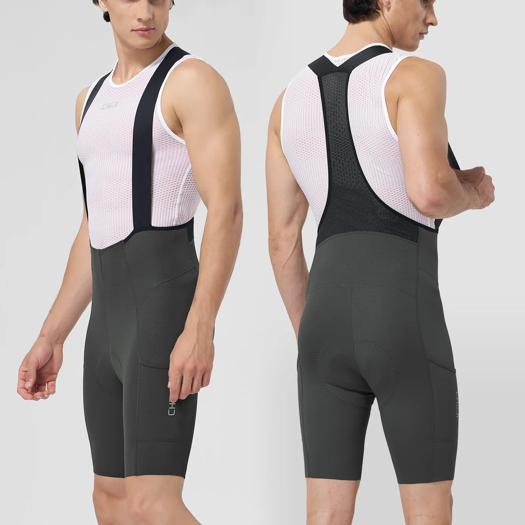 A man wearing grey cycling bib shorts over a white mesh cycling jersey, front and back view.