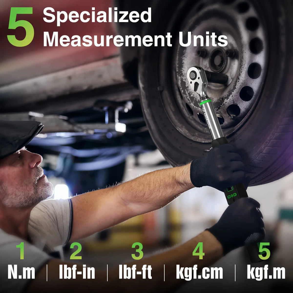 Technician using a digital torque wrench to tighten a car wheel bolt