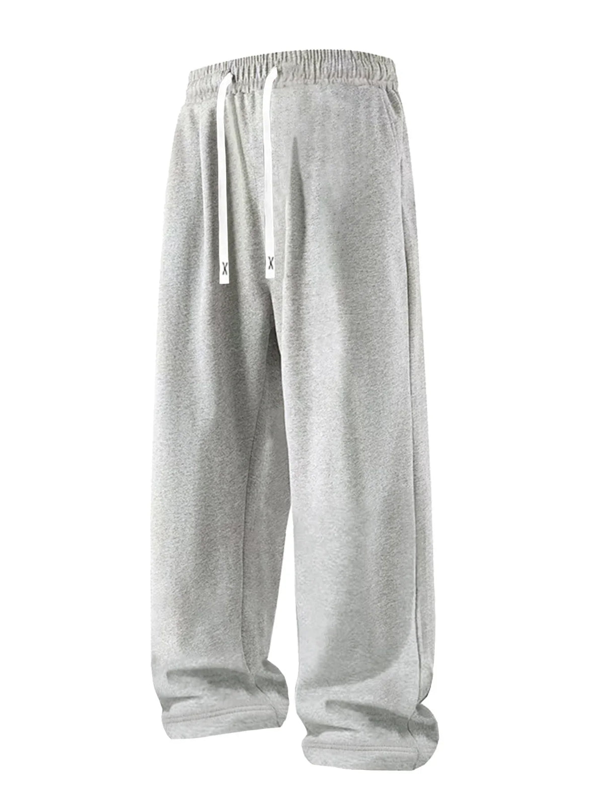 Grey loose drawstring sports pants with straight leg fit.